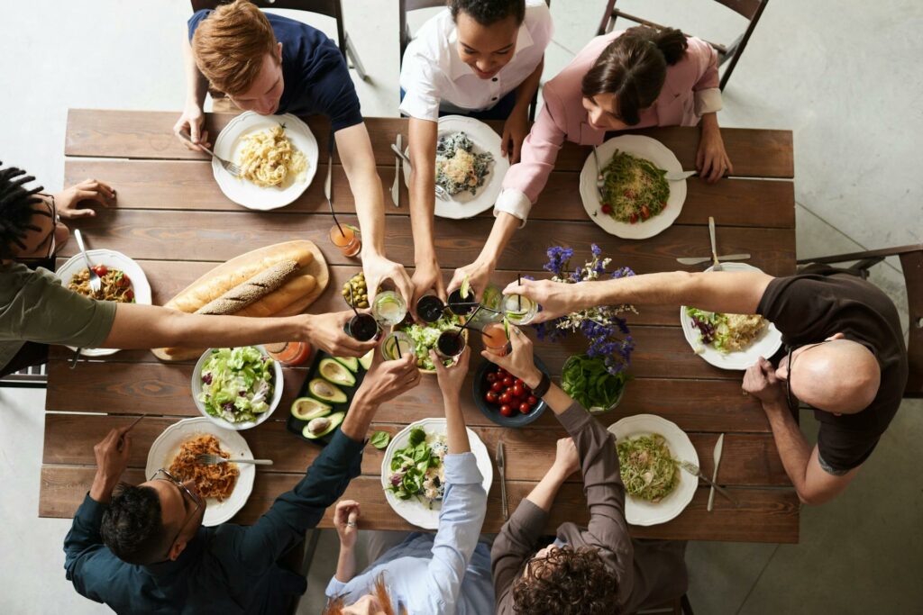 Community Gathering Around Food at a Table