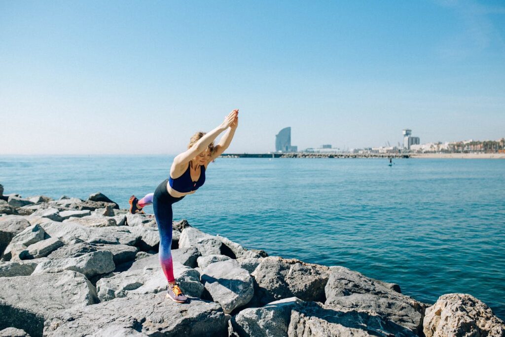Woman doing yoga in Spain