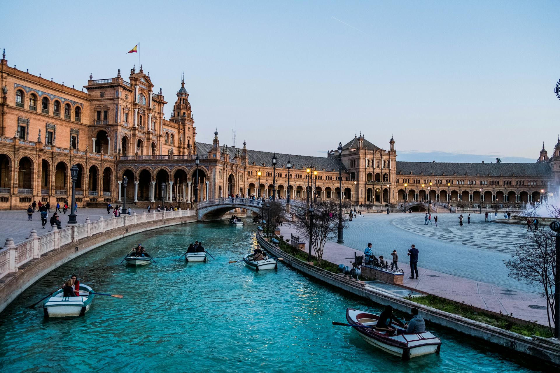 People on Boats near Residence in Seville, Spain